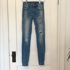 American Eagle light wash denim skinny jeans.